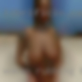 Woman rubbing breast